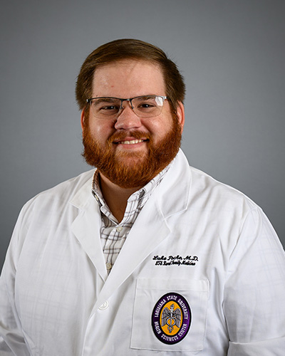 Luke Poche', M.D.
